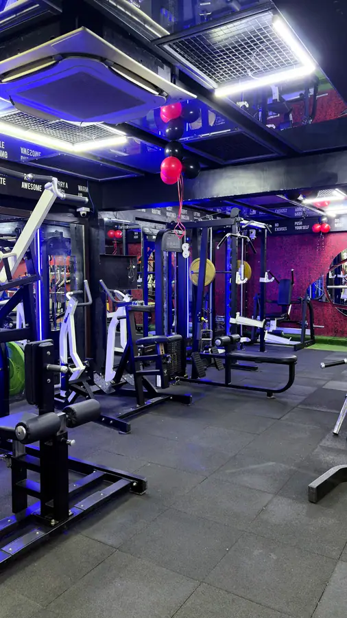 A row of selectorised machines facing the mirrored wall